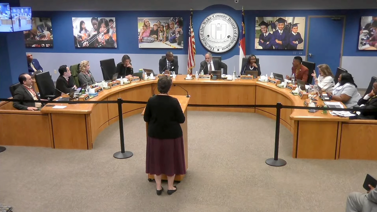 Wake County school board members argue whether to allow teachers to apply for grants from the group We Need Diverse Books at its Feb. 20, 2024 meeting in Cary, N.C.