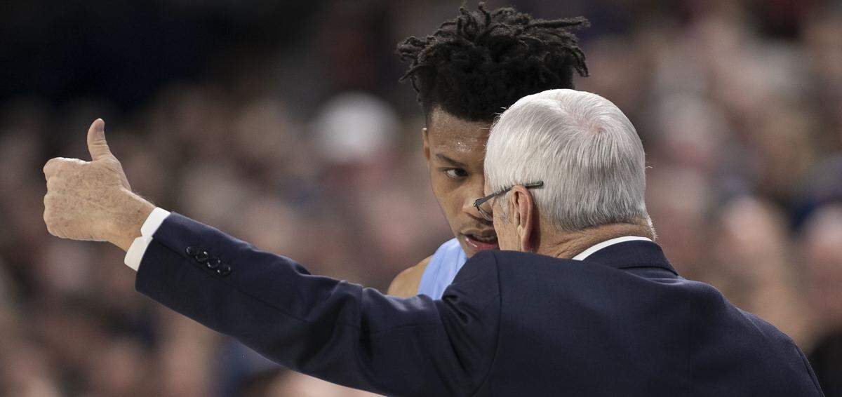 North Carolina coach Roy Williams has a word with Christian Keeling (55) during the closing minutes of play against Gonzaga on Wednesday, December 18, 2019 at McCarthey Athletic Center in Spokane, Washington.
