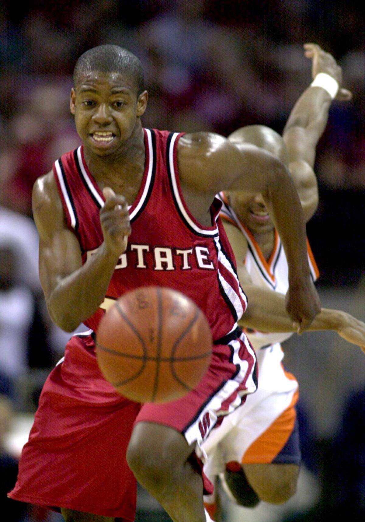 N.C. State's Justin Gainey races chases down a loose ball against Virginia in 2000.
