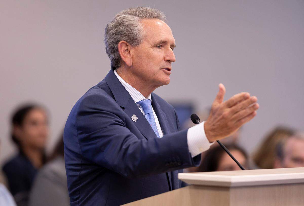 North Carolina Athletic Director Bubba Cunningham addresses the UNC Board of Trustees on Wednesday, May 21, 2025 in Chapel Hill, N.C. 