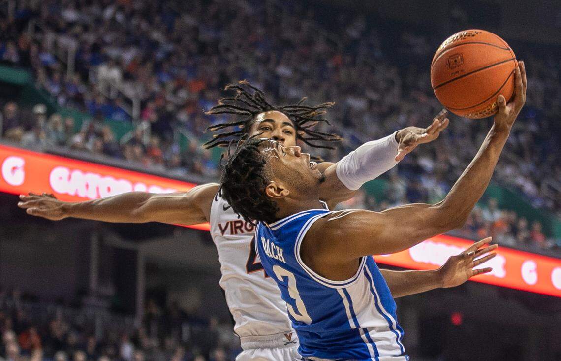 Duke’s Jeremy Roach (3) drives to the basket against Virginia’s Armaan Franklin (4) during the first half in the championship game of the ACC Tournament on Saturday, March 11, 2023 at the Greensboro Coliseum in Greensboro, N.C.