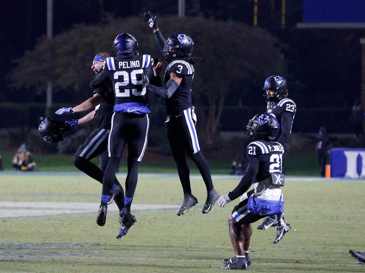 Duke’s Todd Pelino (29) is congratulated by teammates after kicking a field goal to give the Blue Devils a 24-21 win over Wake Forest on Thursday, Nov. 2, 2023, at Wallace Wade Stadium in Durham, N.C.