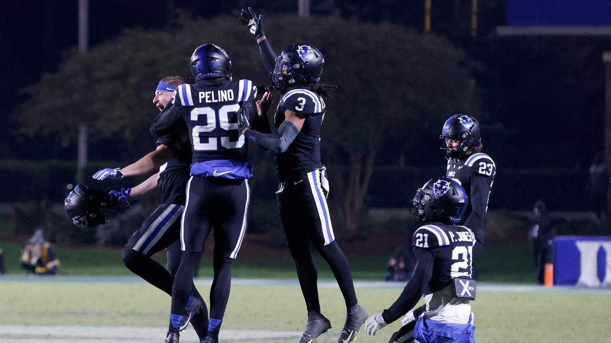 Duke’s Todd Pelino (29) is congratulated by teammates after kicking a field goal to give the Blue Devils a 24-21 win over Wake Forest on Thursday, Nov. 2, 2023, at Wallace Wade Stadium in Durham, N.C.
