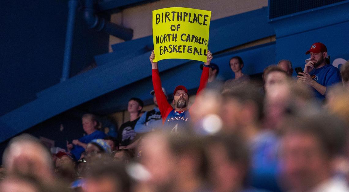 A fan promotes the deep roots between Kansas and North Carolina basketball during the first game between the two schools in Allen Fieldhouse since 1961, on Friday, November 8, 2024 in Lawrence, Kansas.
