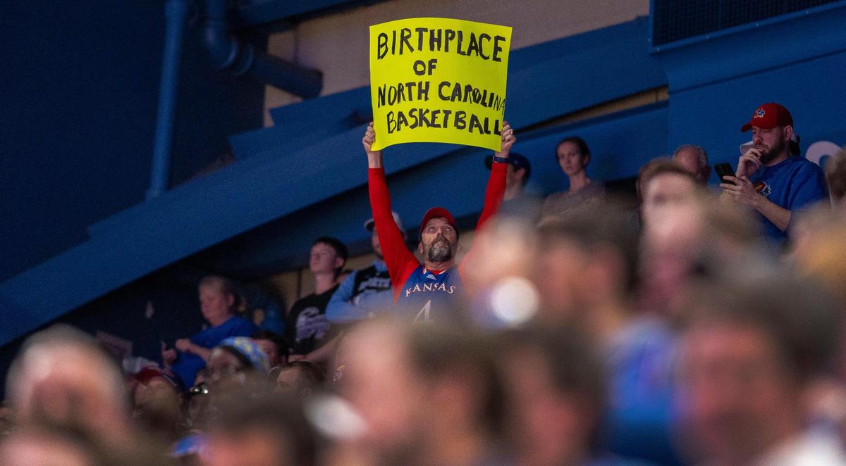 A fan promotes the deep roots between Kansas and North Carolina basketball during the first game between the two schools in Allen Fieldhouse since 1961, on Friday, November 8, 2024 in Lawrence, Kansas.