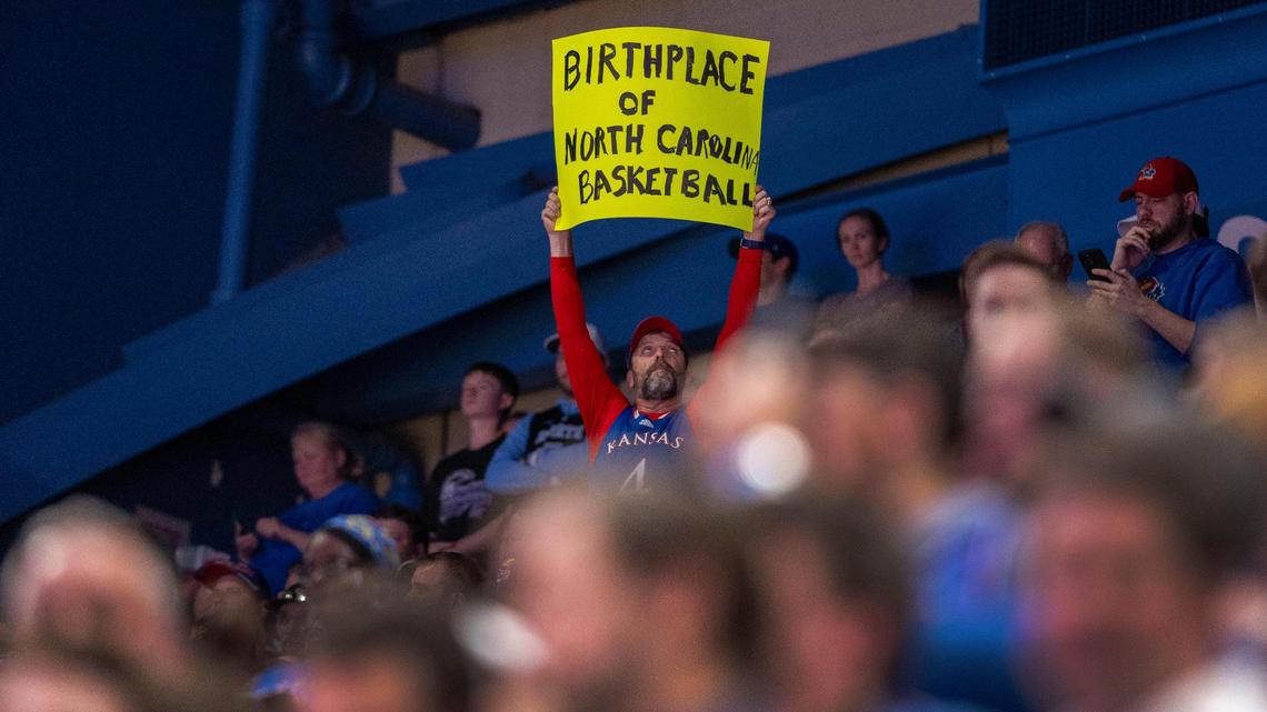 A fan promotes the deep roots between Kansas and North Carolina basketball during the first game between the two schools in Allen Fieldhouse since 1961, on Friday, November 8, 2024 in Lawrence, Kansas.
