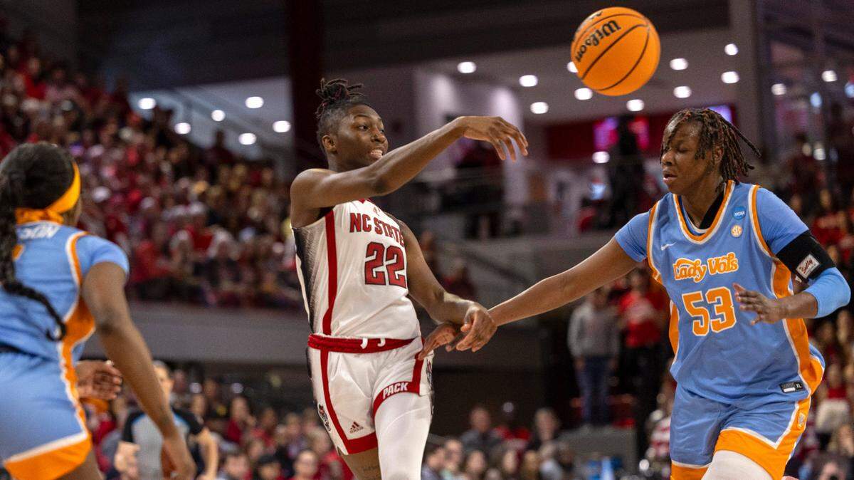 NC State’s Saniya Rivers (22) passes the ball against Tennessee during the first half of the second round of the Division I Women’s Basketball Championship at Reynolds Coliseum in Raleigh, North Carolina, on March 25, 2024.