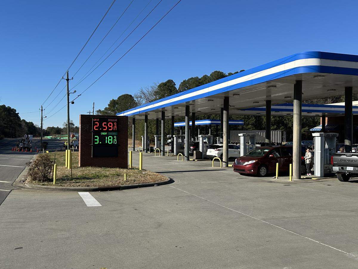 The brick sign and gas pumps at the Sky Mart on Old U.S. 1 at the U.S. 1 interchange in Chatham County. The store’s owner says the N.C. Department of Transportation plans to take the sign and the property to within a few feet of the pumps to widen Old U.S. 1 near the site of a planned VinFast electric car factory.