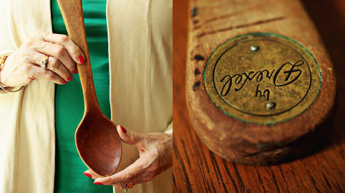 Susan Russell of Raleigh holds her mother's wooden strawberry spoon that was only used to make strawberry preserves.