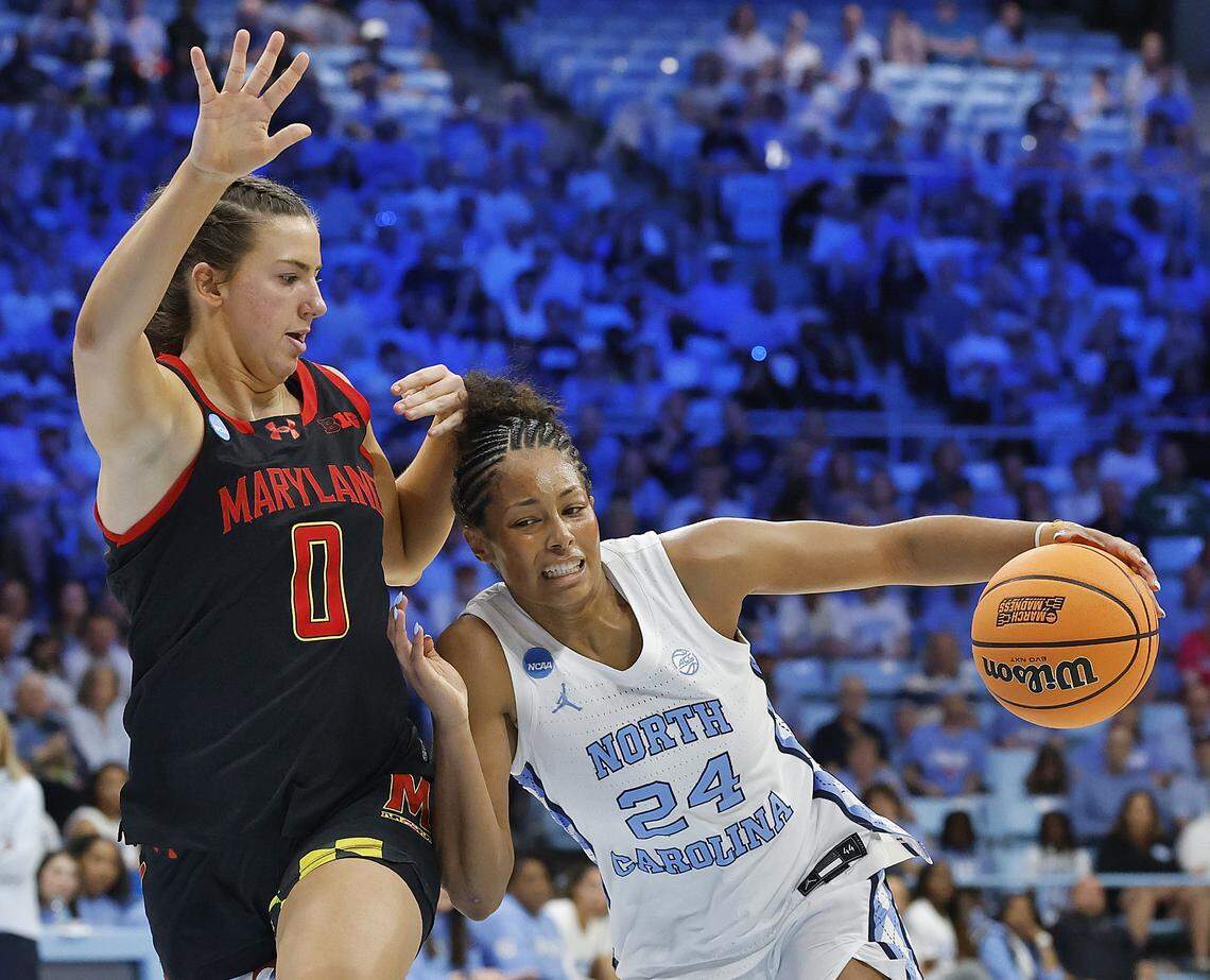 North Carolina’s Indya Nivar drives against Maryland’s Rainey Welson during the first half of the Tar Heels’ 74-66 second-round NCAA Tournament win on Sunday, March 22, 2026, at Carmichael Arena in Chapel Hill, N.C.