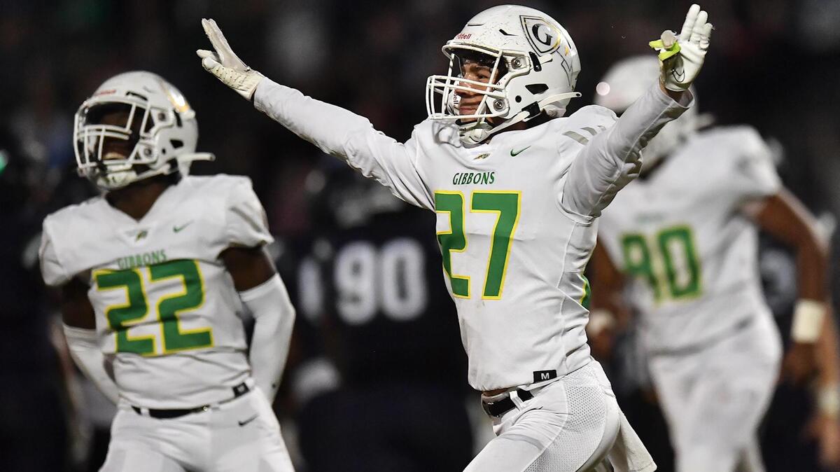 Cardinal Gibbons’ Nolan Wirick (27) celebrates the missed Leesville Road field goal attempt during the second half. The Leesville Road Pride and the Cardinal Gibbons Crusaders met in a football game in Raleigh, N.C. on October 7, 2022.