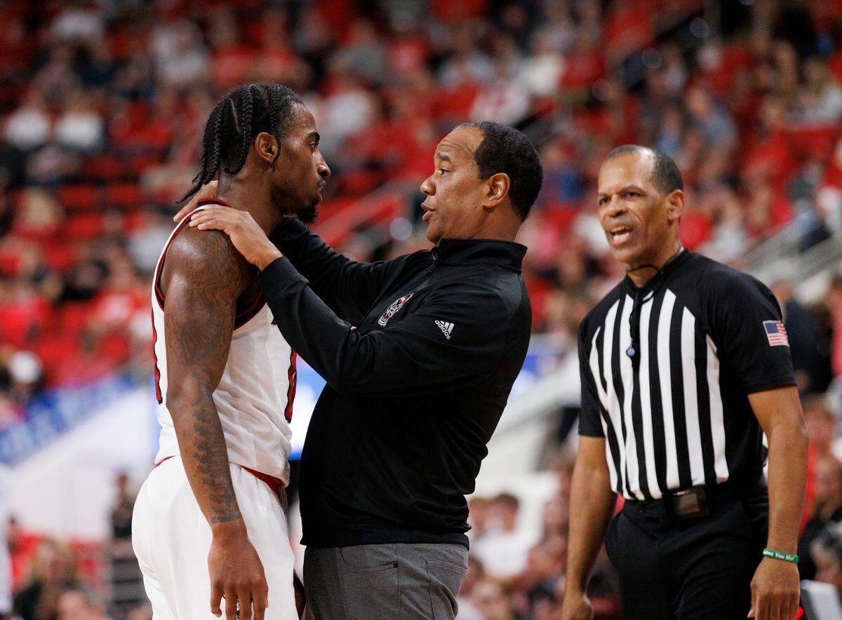 N.C. State head coach Kevin Keatts has a word with Marcus Hill, Jr. during the second half of the Wolfpack’s 97-66 win over USC Upstate on Monday, Nov. 4, 2024, at the Lenovo Center in Raleigh, N.C.