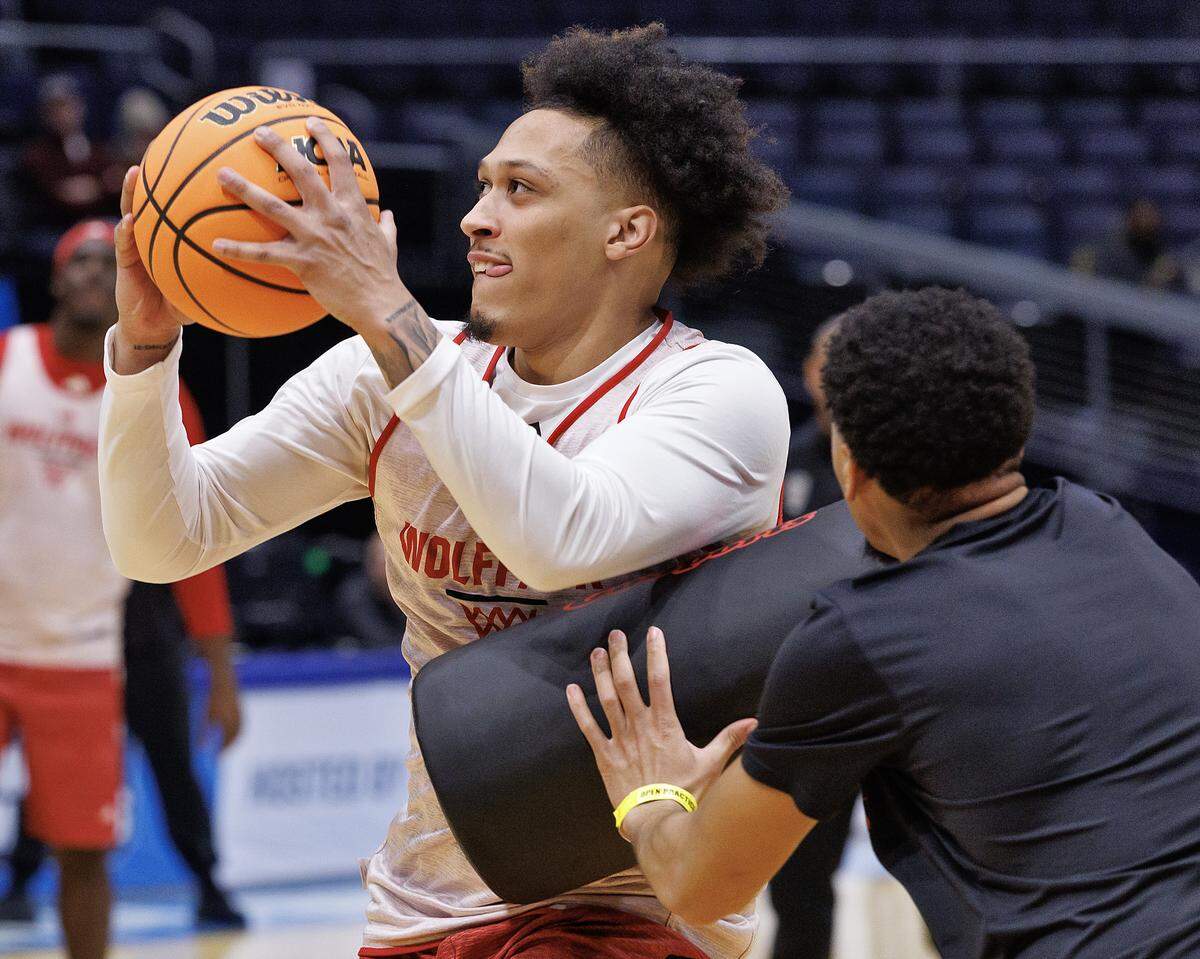N.C. State’s Darrion Williams drives to the basket during practice at University of Dayton Arena in Dayton, Ohio on Monday, March 16, 2026. The Wolfpack will face Texas in the First Four on Tuesday.