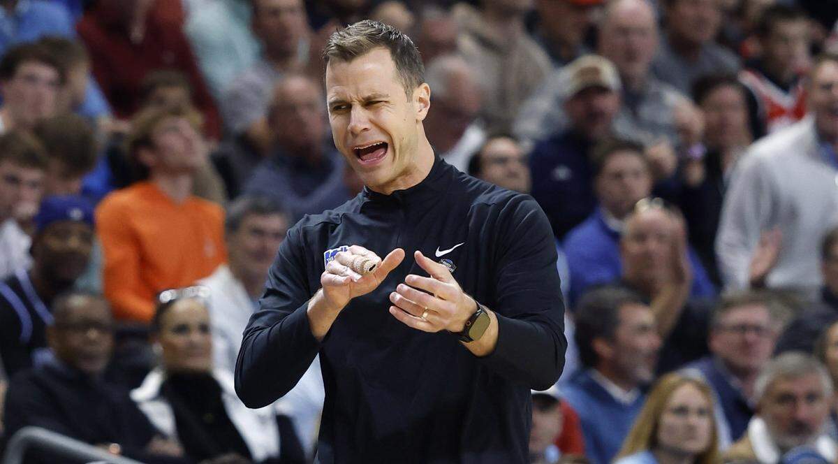Duke head coach Jon Scheyer is upset they were called for a foul in the first half of Duke’s game against Siena in the first round of the NCAA Men’s Basketball Tournament at  Bon Secours Wellness Arena in Greenville, S.C., Thursday, March 19, 2026.