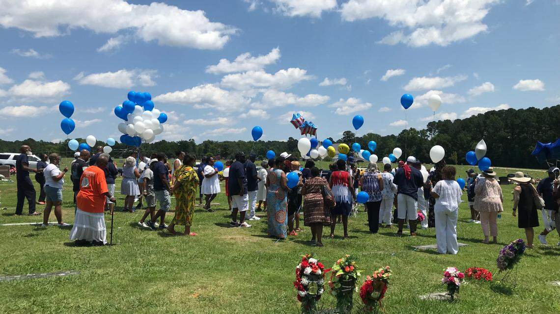 Friends and family of Paulette Thorpe gather at Beechwood Cemetery in Durham on July 4, 2021, to mark the one-year anniversary of her death from celebratory gunfire.