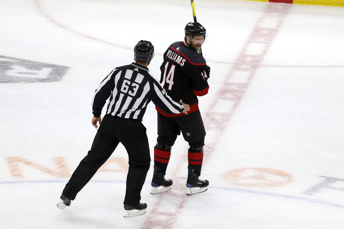 Carolina’s Justin Williams (14) heads to the penalty box after being called for a penalty during the first period of the Carolina Hurricanes’ game against the Boston Bruins in game three of the Eastern Conference finals at PNC Arena in Raleigh, N.C. Tuesday, May 14, 2019.