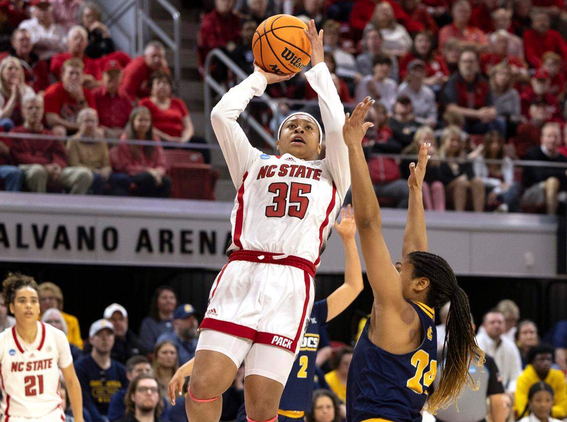 NC State’s Zoe Brooks (35) shoots over Chattanooga’s Jada Guinn (24) during the first half of their game in the first round of the NCAA Division I Women’s Basketball Championship at Reynolds Coliseum in Raleigh, NC on Saturday, March 23, 2024.