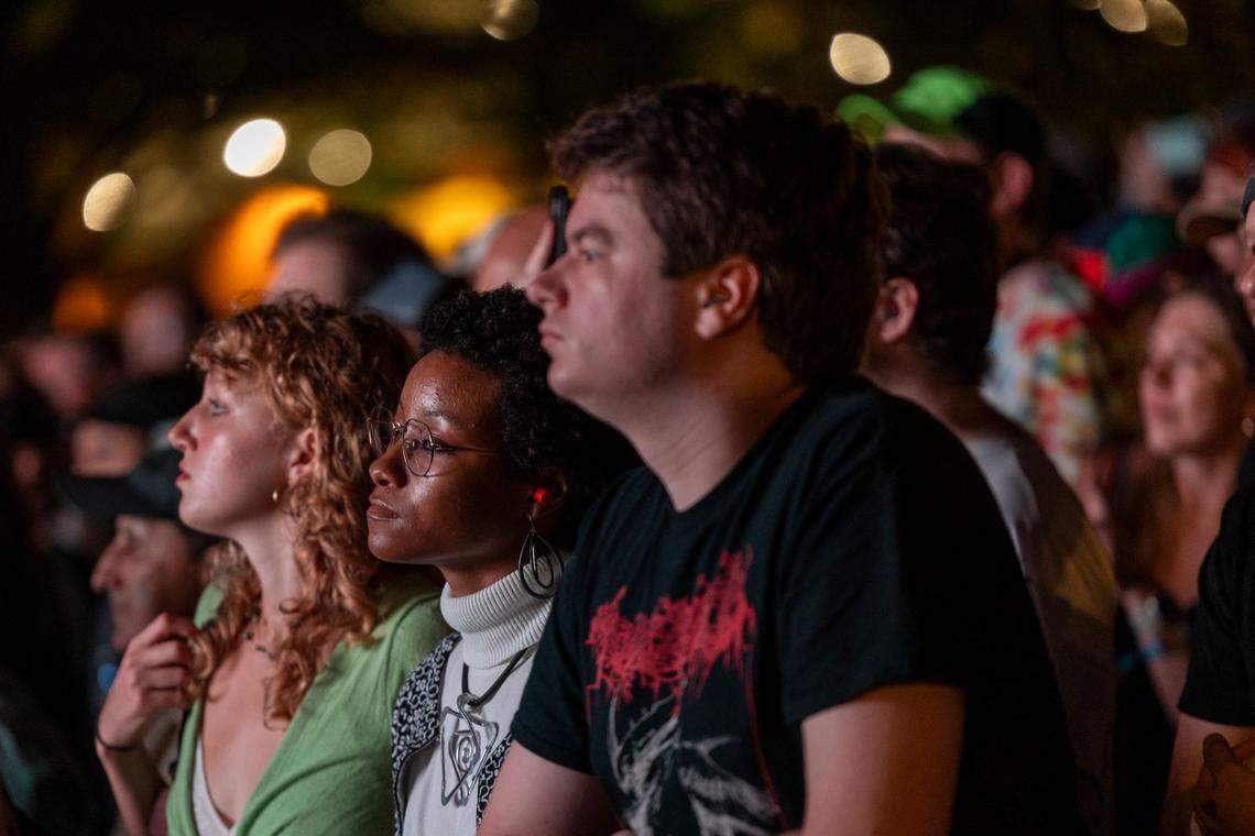 Concert-goers watch BADBADNOTGOOD perform at Moore Square in Raleigh during the Hopscotch Music Festival on Friday, Sept. 6, 2024.