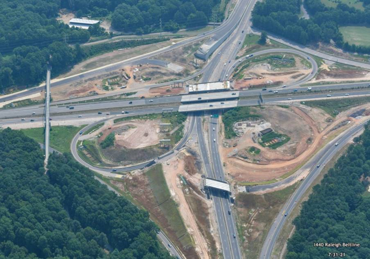 An aerial photo of the Wade Avenue/Beltline interchange in the early phases of construction.
