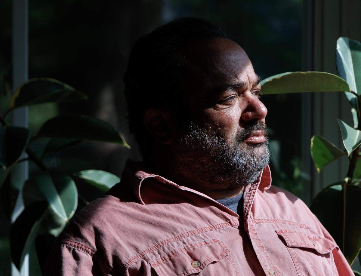 Durham resident Marcelo Levy, photographed on Thursday, April 10, 2025, says he worries how the policies of the Trump administration will affect his life. Levy is a naturalized citizen who came to the United States with his parents from Argentina when he was eight months old. He was diagnosed with HIV/AIDS in 1985.