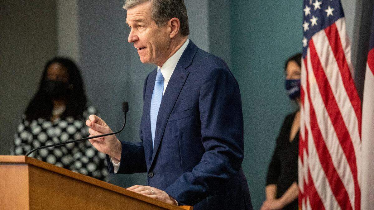 In this March 2021 file photo, Gov. Roy Cooper speaks during a briefing on North Carolina’s coronavirus pandemic response. A new law taking effect Jan. 1, 2022, limits his powers about the duration of states of emergency.