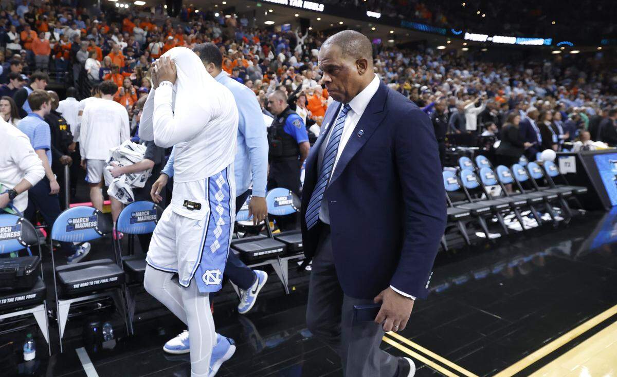 North Carolina coach Hubert Davis walks off the court after VCU’s 82-78 overtime victory over UNC in the first round of the NCAA Men’s Basketball Tournament at  Bon Secours Wellness Arena in Greenville, S.C., Thursday, March 19, 2026.