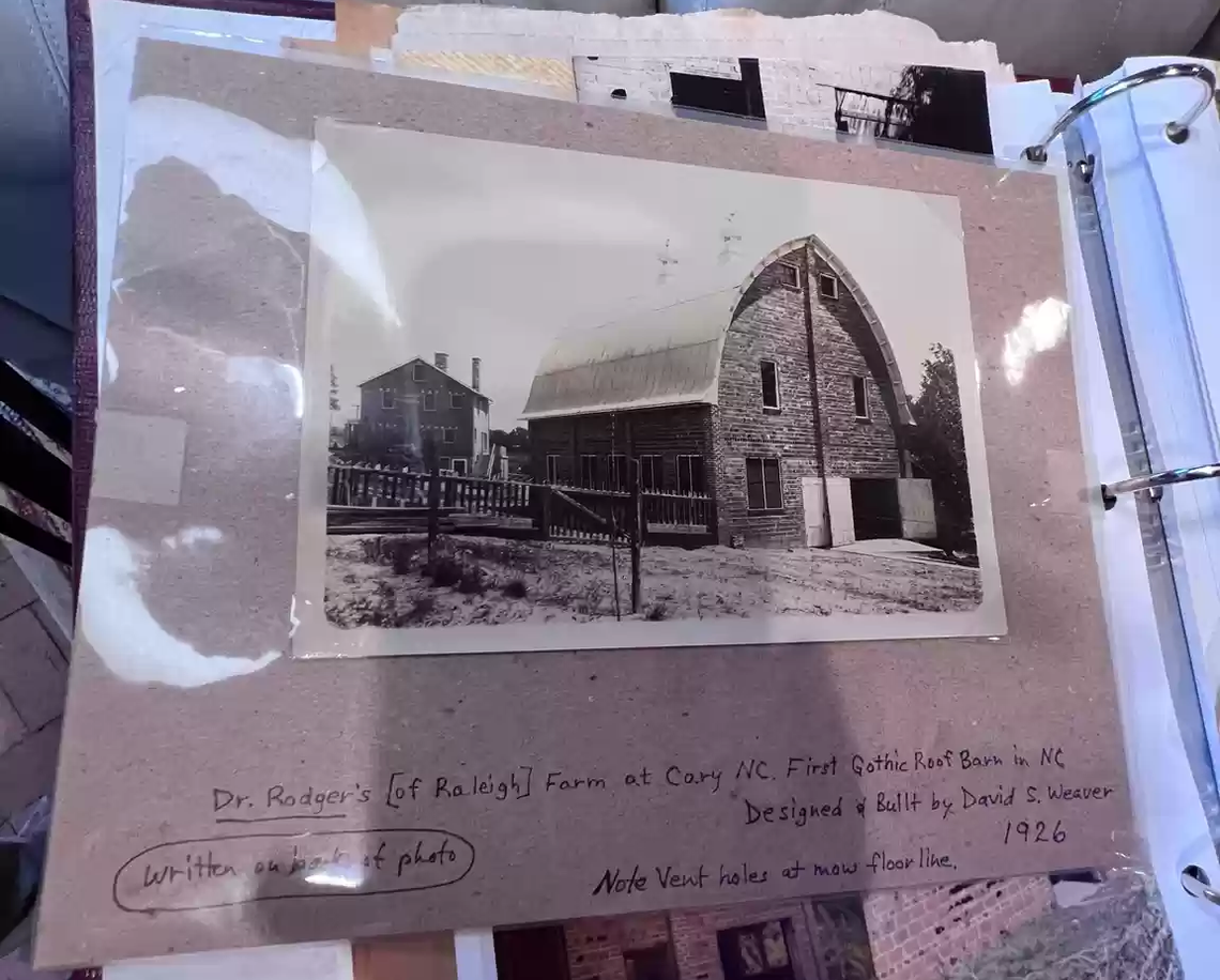 A photo from 1926 of a dairy barn that went up for sale this spring is captioned: “Dr. Rodger’s [of Raleigh] Farm at Cary NC. First Gothic Roof Barn in NC. Designed & Built by David S. Weaver.”