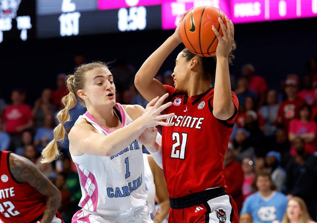 North Carolinas’s Alyssa Ustby pressures N.C. State’s Madison Hayes during the first half of the Tar Heels’ 65-66 win on Sunday, Feb. 16, 2025, at Carmichael Arena in Chapel Hill, N.C.
