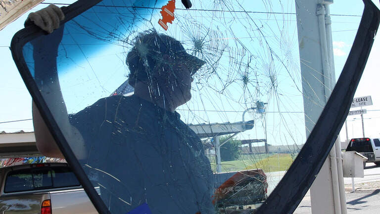 Are ‘not responsible for broken windshield’ signs legal in NC?