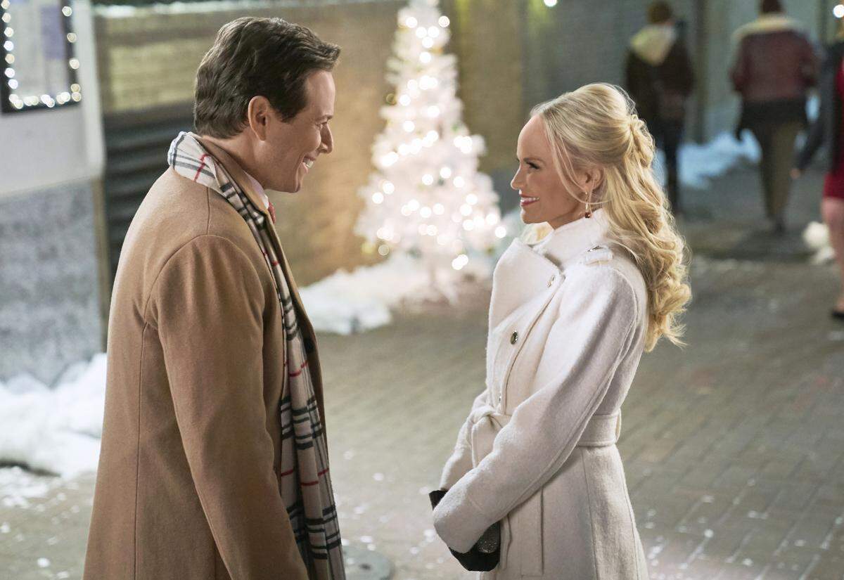 Scott Wolf, left, and Kristin Chenoweth in the Hallmark movie “A Christmas Love Story.”