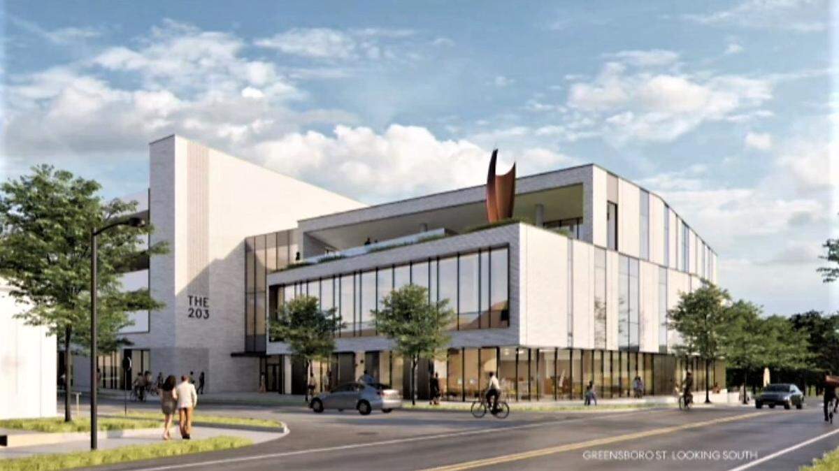 An architect’s rendering shows the new Southern Branch Library at 203 S. Greensboro St. as viewed from the Glasshalfull and Wendy’s restaurants in downtown Carrboro.