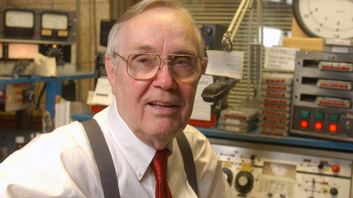 Carl Lamm, longtime radio station owner and broadcaster, photographed in the studio of WMPM-AM in Smithfield in 2002.
