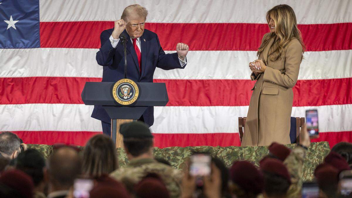 President Donald Trump and First Lady Melania Trump dance to "YMCA" by the Village People after speaking to soldiers from the XVIII Airborne Corps and their families at Fort Bragg in Fayetteville Friday, Feb. 13, 2026.