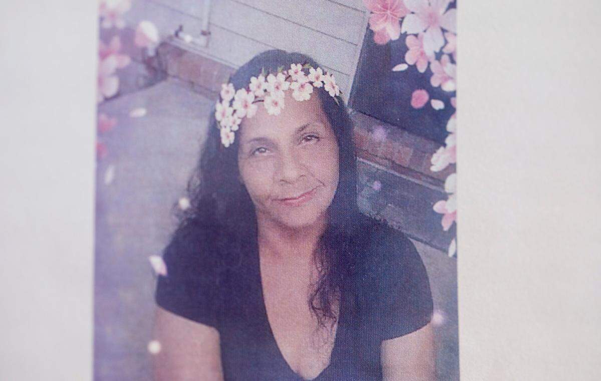 A photograph of Katina Locklear, a Tuscarora woman who lived in Pembroke, NC, is shown on the front of the program from her December 2018 funeral. Locklear, a 46-year-old mother of four and grandmother of two, was raped and murdered in a patch of woods after a dispute over missing money, which was later found elsewhere.