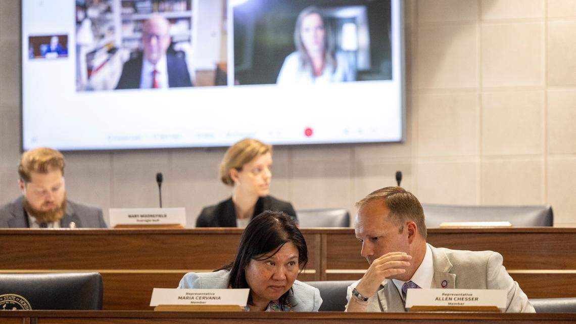 Rep. Maria Cervania, a Wake County Democrat, and Rep. Allen Chesser, a Nash County Republican, speak to each other during the questioning of Alan Hirsch, the chair of the North Carolina State Board of Elections, via video call during a House Oversight Committee hearing on Tuesday, July 23, 2024, at the Legislative Building in Raleigh. Republicans called the board to an oversight hearing to question them about Robert F. Kennedy and Cornel West’s ballot access.