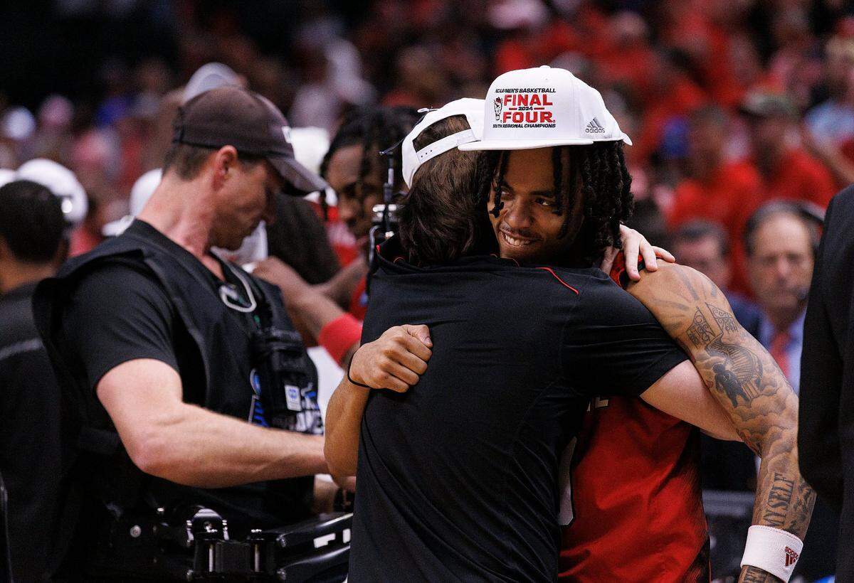 N.C. State’s Breon Pass celebrates following the Wolfpack’s 76-64 win over Duke in the NCAA Tournament Elite Eight on Sunday, March 31, 2024, at American Airlines Center in Dallas, Texas.