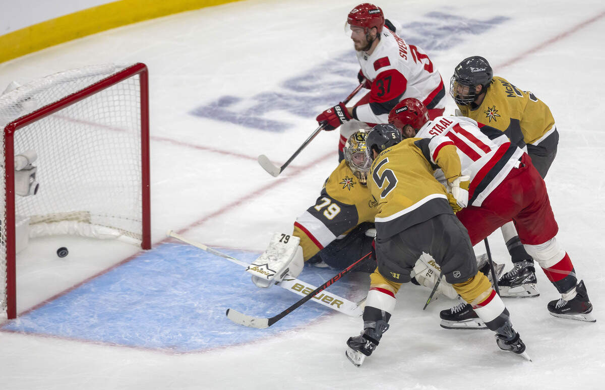 Carolina Hurricanes center Jordan Staal (11) scores on Vegas goalie Carter Hart (79) to take a 3-0 lead in the first period in Game 4 of the Stanley Cup Final against Vegas, on Tuesday, June 9, 2026 in Las Vegas, NV.