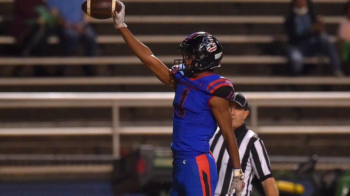 Sanderson’s Levi Matthews (1) reacts after catching the ball near the end zone during the second quarter. The Sanderson Spartans and the Leesville Road Pride met in a football game in Raleigh, N.C. on October 22, 2021.