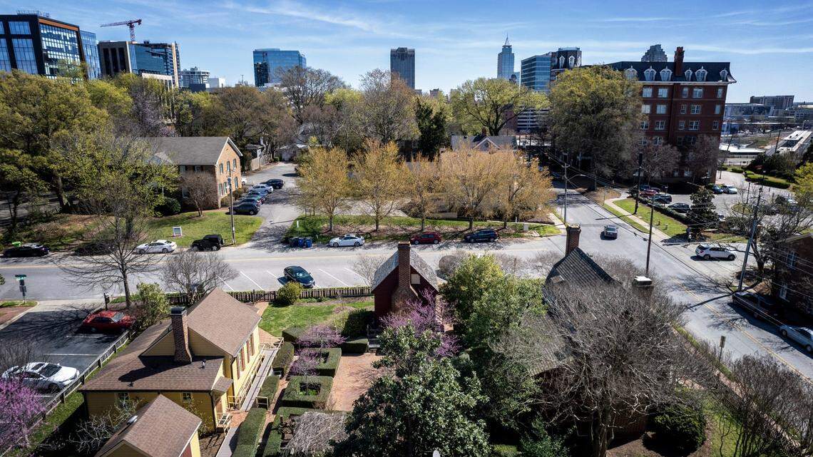 An aerial view of the historic Joel Lane Museum House on St. Mary’s Street in Raleigh, lower center, and the current site, top center, where developers have submitted a zoning request to build up to 20 stories across the street from the Joel Lane House.