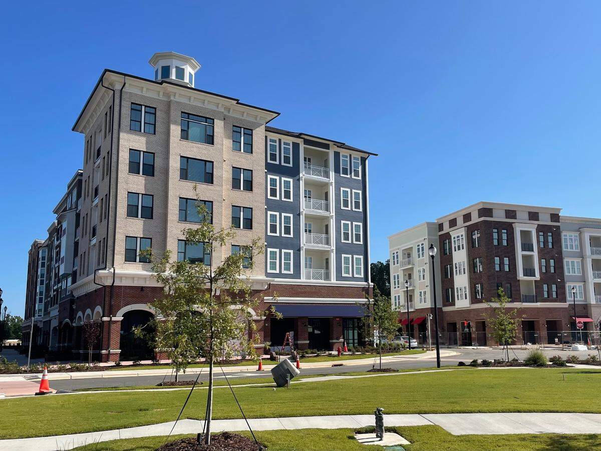 Housing and retail are located in the new Sweetwater Town Center development in Apex, North Carolina.