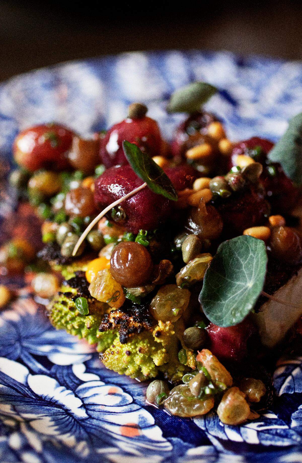 The roasted cauliflower with sweet potato, caper, date, pine nut and grape at Littler in Durham on Thursday, Feb. 24, 2022.
