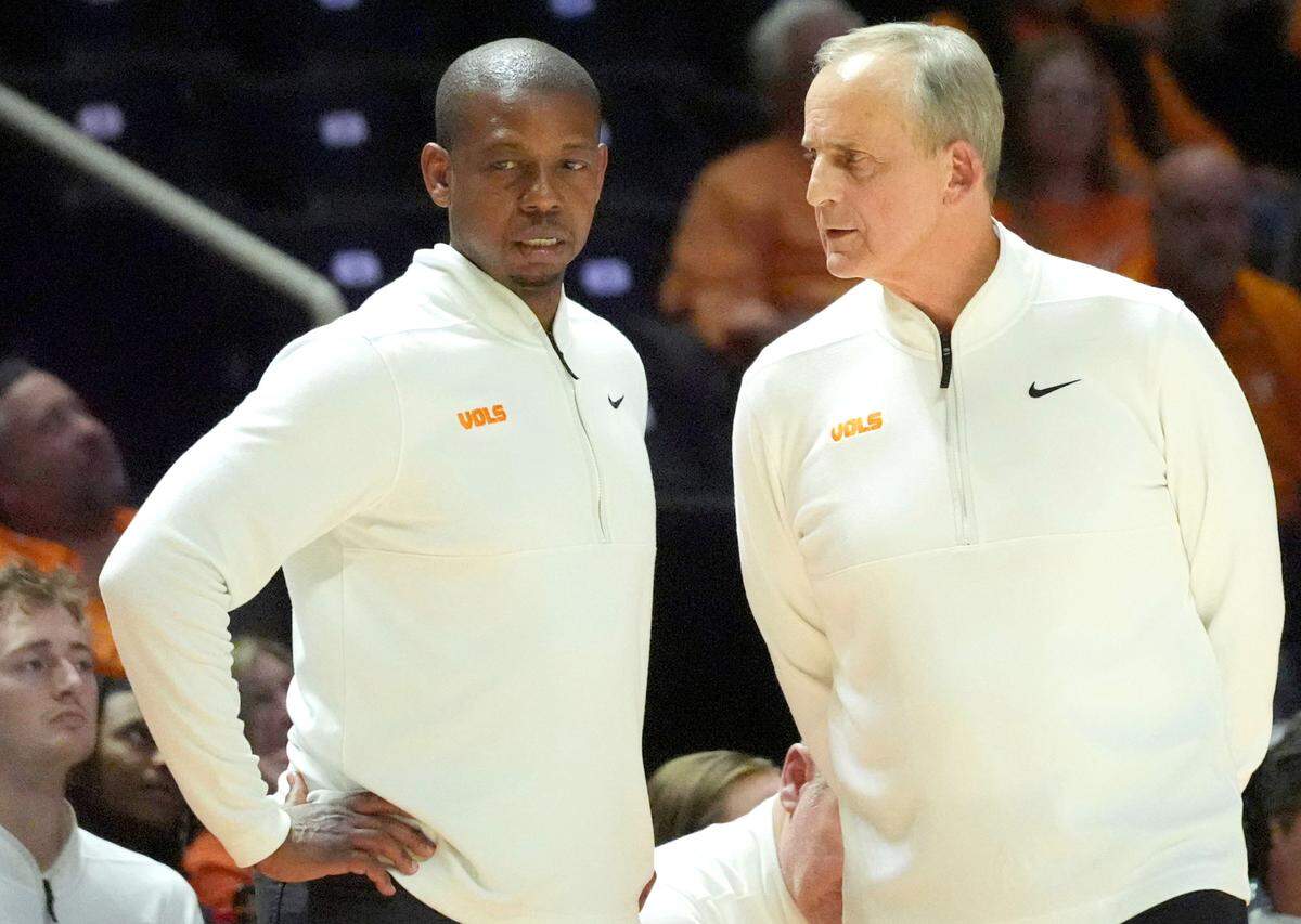 Tennessee basketball coach Rick Barnes tallks with assistant coach Justin Gainey during their game against Missouri on Feb. 5, 2025, in Knoxville, Tennessee.