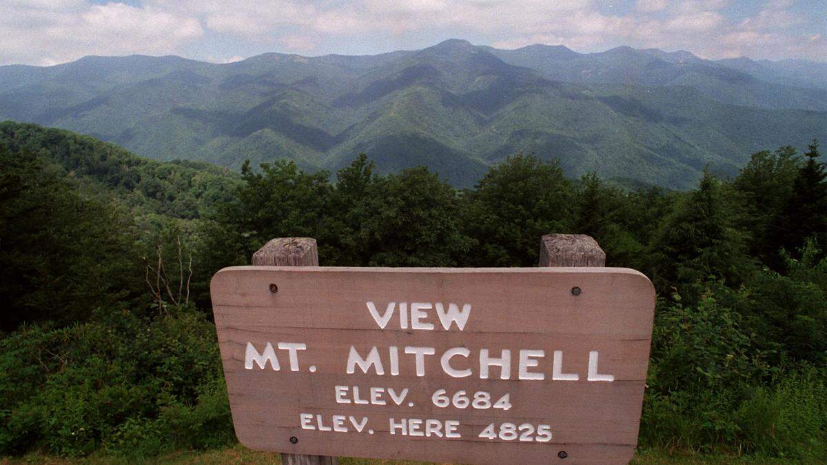 Mount Mitchell State Park had to close Thursday due to snow and ice — surprising news for a period when tourists are expecting to see to see bright fall foliage.