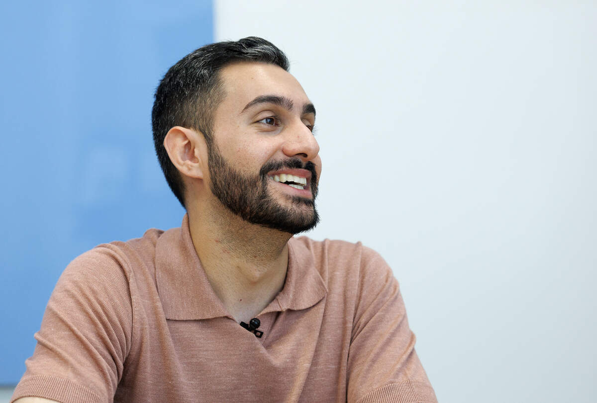 Matin Maani, a seventh-grade social studies teacher at Apex Friendship Middle School, smiles while talking with a reporter on Thursday, May 21, 2026. Maani was named the 2026 Wake County Teacher of the Year.