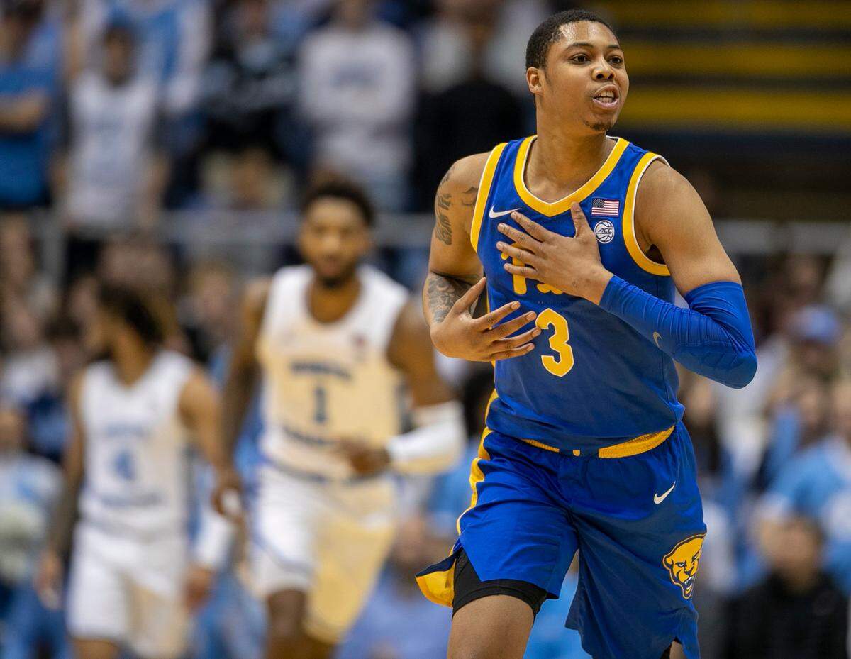 Pittsburgh’s Greg Elliott (3) reacts after a three point basket in the first half against North Carolina on Wednesday, February 1, 2023 at the Smith Center in Chapel Hill, N.C.