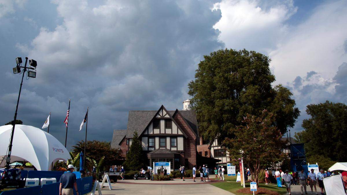 Thunderstorm clouds brought lightning, causing a weather delay, later in the day during the first round at the Wyndham Championship golf tournament at Sedgefield Country Club in Greensboro, N.C. on Thursday, August 12, 2021. (AP Photo/Chris Seward)