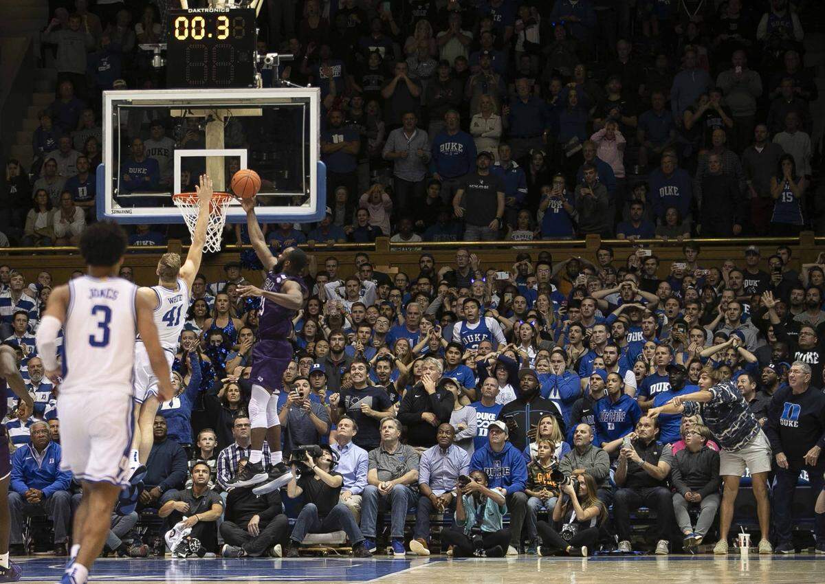 Stephen F. Austin’s Nathan Bain (23) scores the game winning basket to give the Lumberjacks’s a 85-83 overtime victory over Duke on Tuesday, November 26, 2019 at Cameron Indoor Stadium in Durham, N.C.