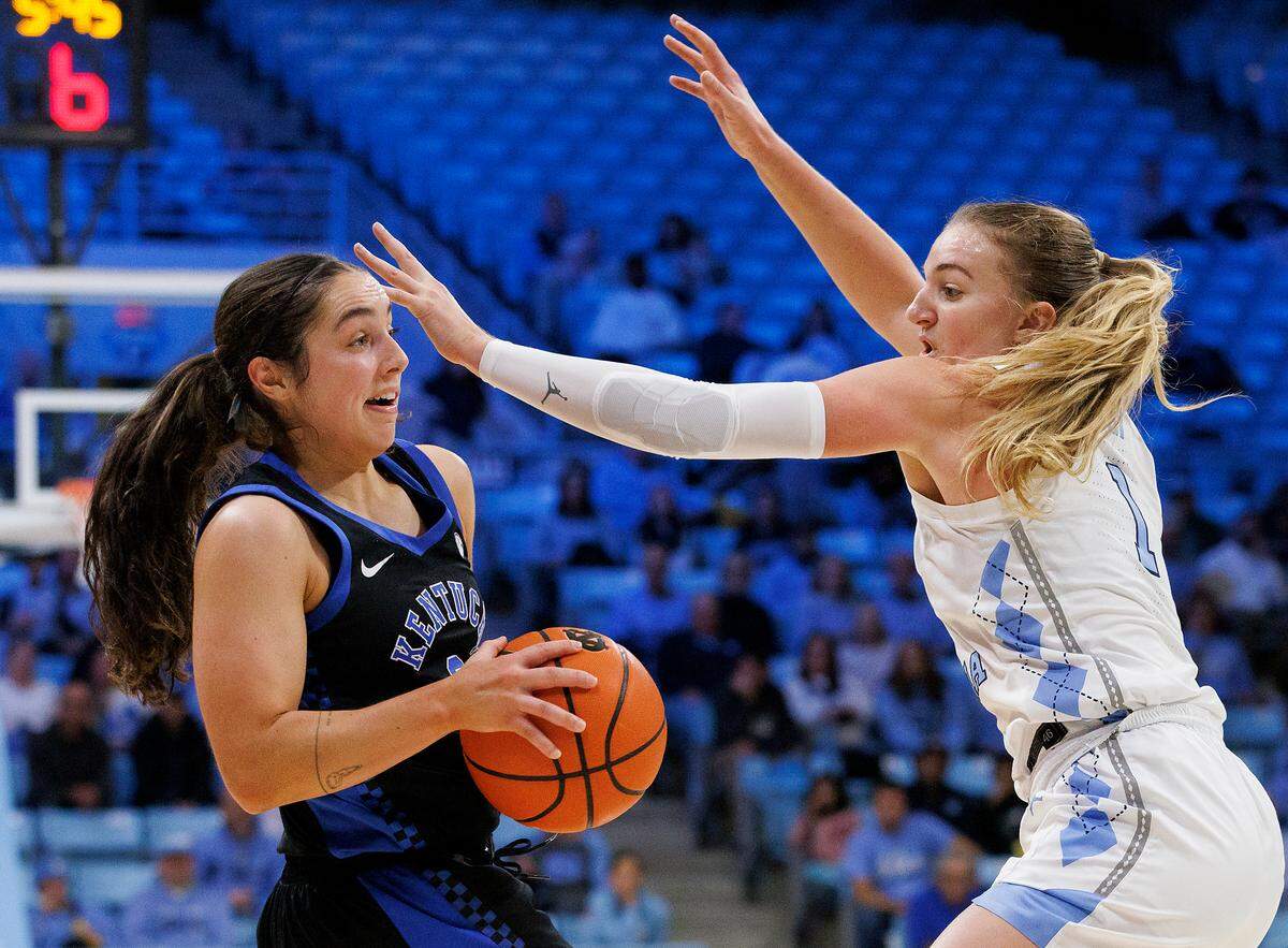 North Carolina’s Alyssa Ustby pressures Kentucky’s Georgia Amoore during the second half of the Tar Heels’ 72-53 win on Thursday, Dec. 5, 2024, at Carmichael Arena in Chapel Hill, N.C.
