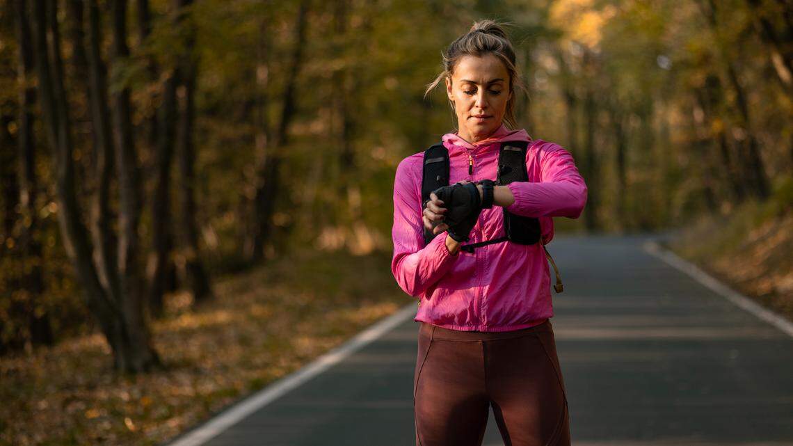 Woman stretching before outdoor training and running
