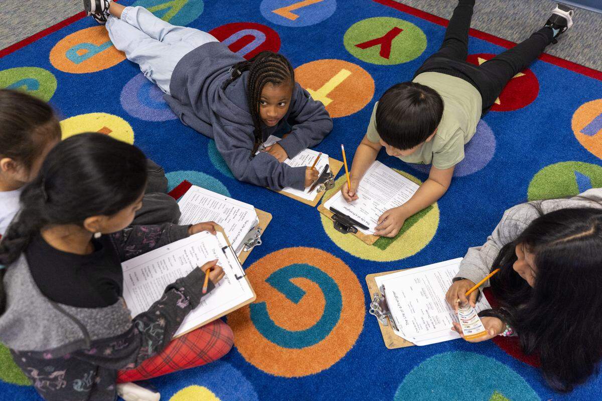 Second-graders work on a group assignment Thursday, April 30, 2026, at Aversboro Elementary School in Garner.